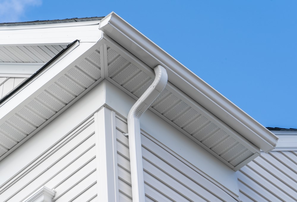 Clean white soffit and fascia trim on a residential home exterior